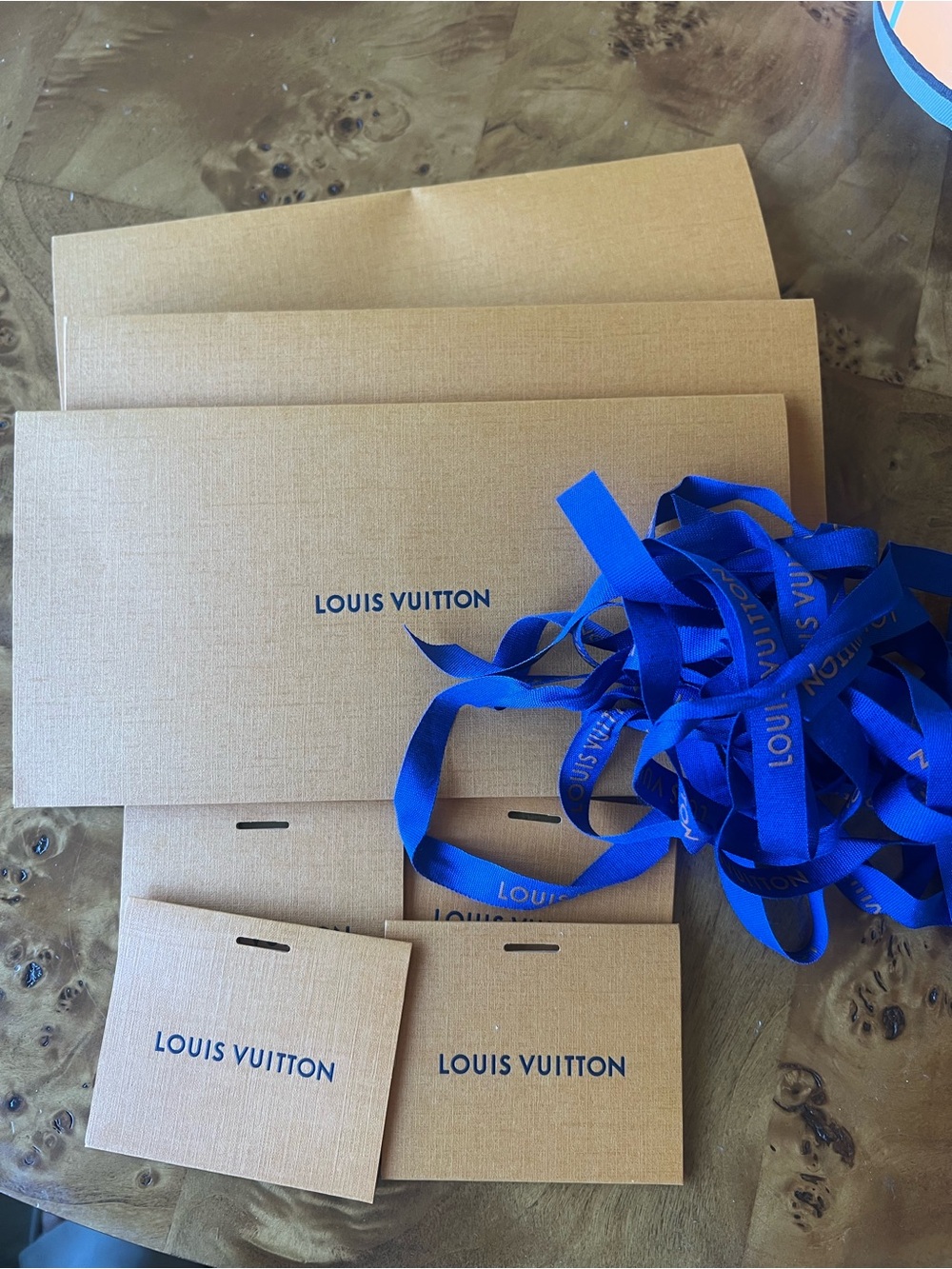 Louis Vuitton packaging with ribbon bundle